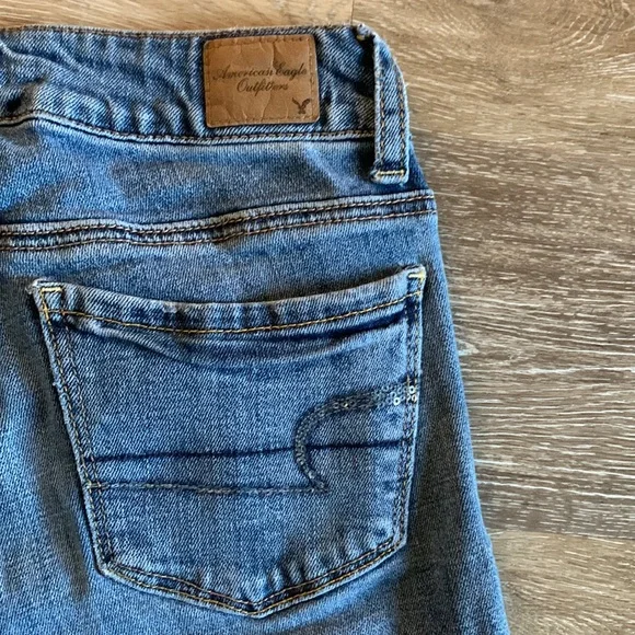 Distressed American Eagle low-rise jeans with sequin details - Picture 1 of 5